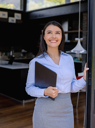 Realtor and homeowner reviewing design plans